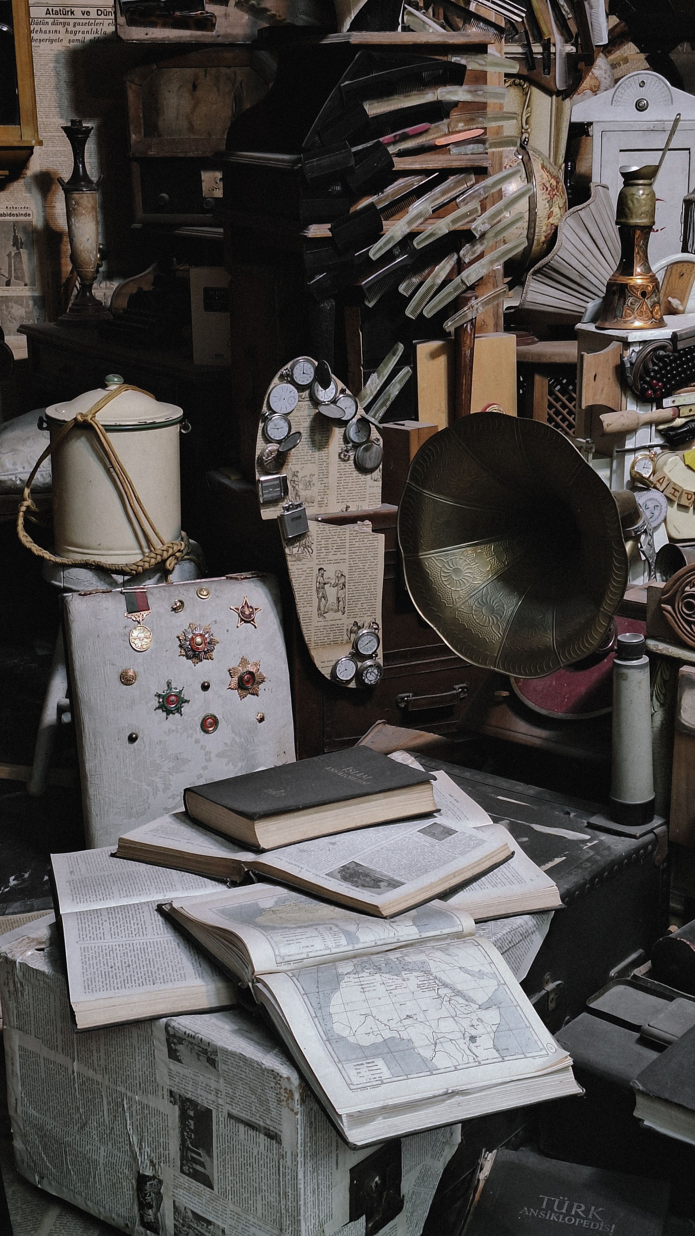 Books, maps, and archival study materials in a history-focused room