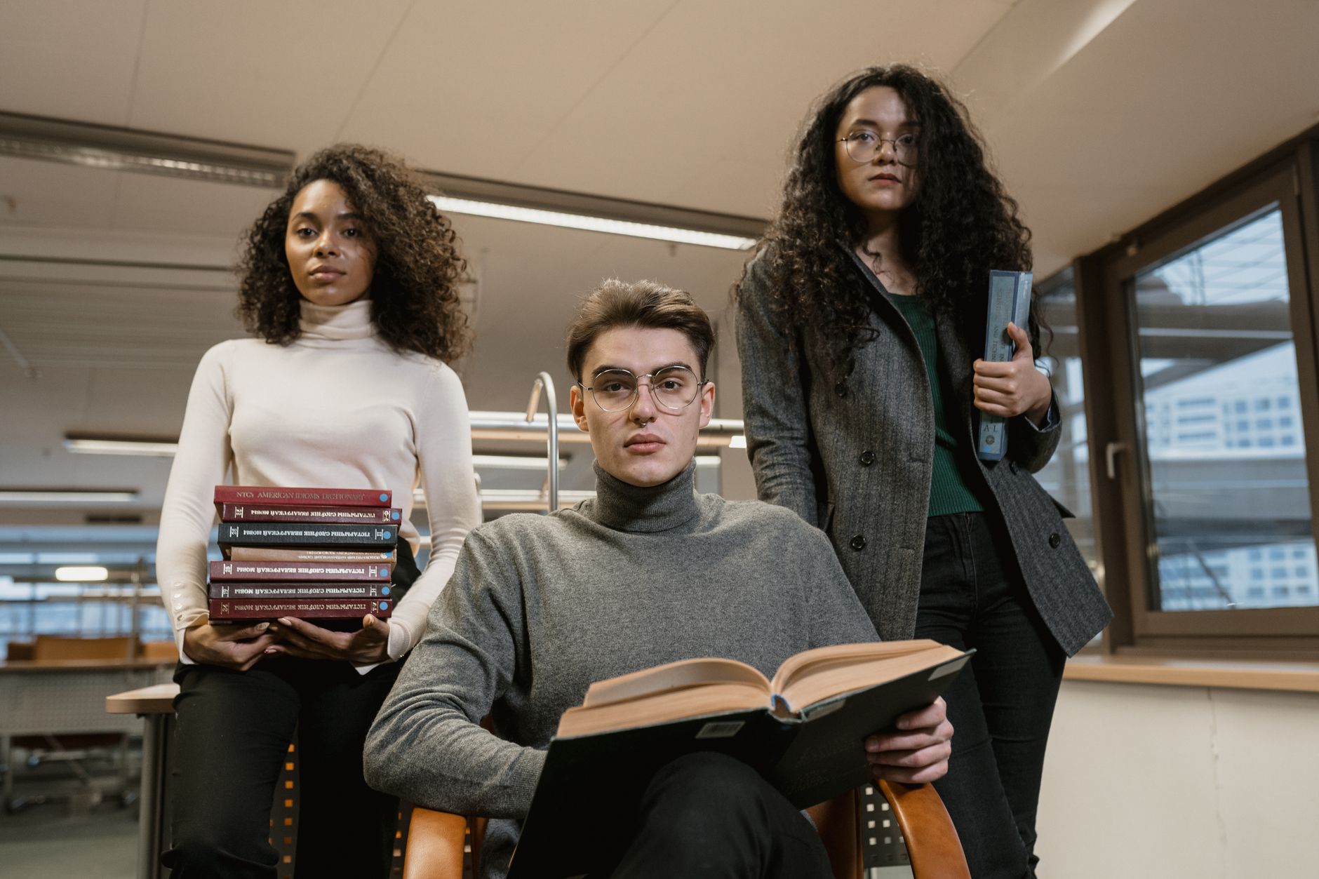 college students holding books